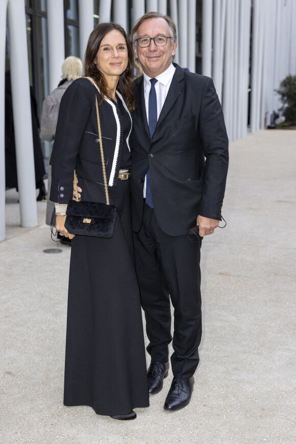Bruno Pavlovsky et son épouse Nathalie assistent au défilé de mode Chanel Métiers d'Art 2021-2022 au 19M. Paris, le 7 décembre 2021. © Olivier Borde/Bestimage