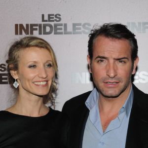 Alexandra Lamy et Jean Dujardin lors de l'avant-premiere des Infideles à Paris.