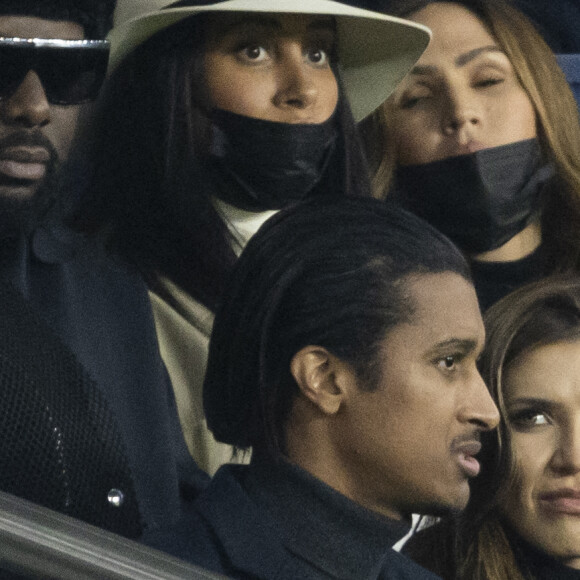 Gims et sa femme Demdem, Vitaa - People au match de Ligue 1 Uber Eats "PSG contre Monaco (2-0)" au Parc des Princes à Paris le 12 décembre 2021. © Cyril Moreau/Bestimage