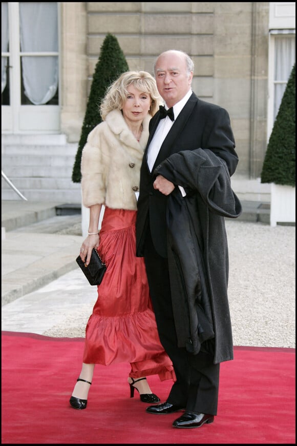 Georges Wolinski et sa femme Maryse lors d'un dîner de gala donné à l'Elysée en l'honneur du président portugais Jorge Sampaio, en 2005.