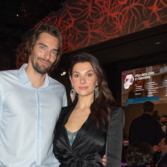 Exclusif - Le nageur Camille Lacourt et sa compagne Alice Detollenaere lors de la soirée de gala de l'Institut Rafaël, maison de l'après Cancer, au Pavillon Gabriel à Paris le 13 décembre 2021. © Erez Lichtfeld / Bestimage