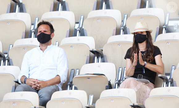 Christophe Michalak et sa compagne dans les tribunes des Internationaux de France de Tennis de Roland Garros à Paris. Le 10 juin 2021 © Dominique Jacovides / Bestimage 