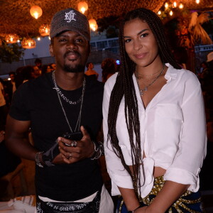 Exclusif - Black M (Alpha Diallo) et sa femme Léa Djadja lors de la soirée qui se tenait sur la terrasse éphémère "Barbanegra" à Paris, le 6 juillet 2021. © Rachid Bellak/Bestimage