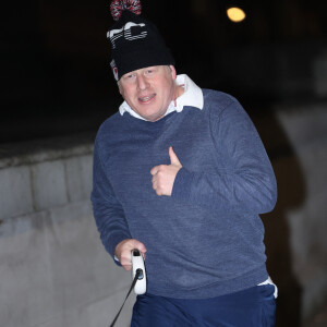 Le Premier ministre Boris Johnson fait son jogging avec son Jack Russell "Dilyn" dans le centre de Londres, Royaume Uni, le 26 janvier 2022.