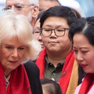 Le prince Charles, prince de Galles, et Camilla Parker Bowles, duchesse de Cornouailles, visitent Chinatown à l'occasion du Nouvel An lunaire à Londres, Royaume Uni, le 1er février 2022. 