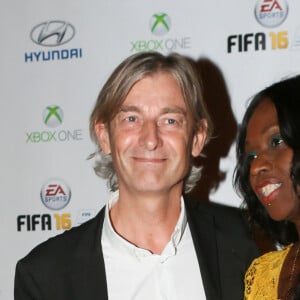 Gilles Verdez et sa compagne Fatou - Soirée de lancement du jeu vidéo "FIFA 2016" au Faust à Paris, le 21 septembre 2015.