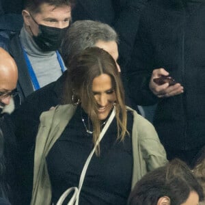 Vitaa (enceinte de son 3ème enfant) et son mari Hicham Bendaoud - People lors de la huitième de finale aller de la Ligue des champions entre le PSG et le Real Madrid au Parc des Princes à Paris le 15 février 2022. © Cyril Moreau/Bestimage