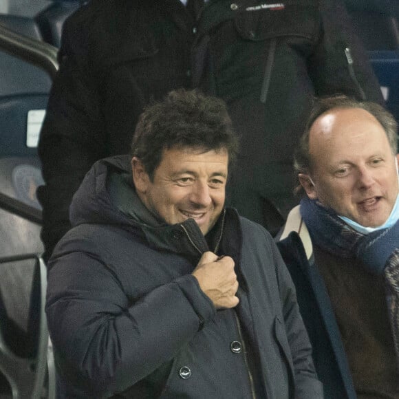 Patrick Bruel - People lors de la huitième de finale aller de la Ligue des champions entre le PSG et le Real Madrid au Parc des Princes à Paris le 15 février 2022. © Cyril Moreau/Bestimage
