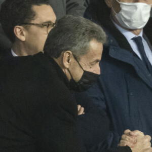 Nicolas Sarkozy, Alain Prost - People lors de la huitième de finale aller de la Ligue des champions entre le PSG et le Real Madrid au Parc des Princes à Paris le 15 février 2022. © Cyril Moreau/Bestimage
