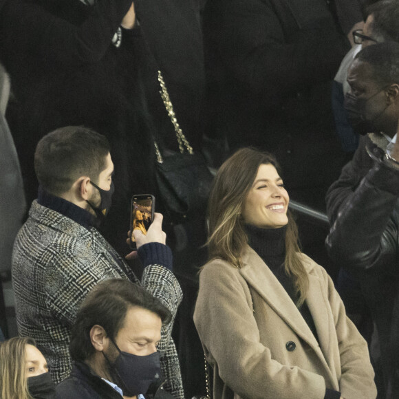 Nikola Karabatic et sa compagne Geraldine Pillet - People lors de la huitième de finale aller de la Ligue des champions entre le PSG et le Real Madrid au Parc des Princes à Paris le 15 février 2022. © Cyril Moreau/Bestimage