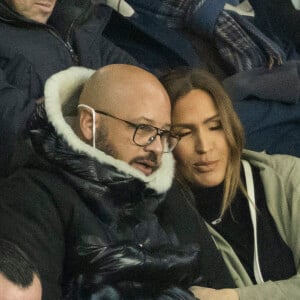 Vitaa (enceinte de son 3ème enfant) et son mari Hicham Bendaoud - People lors de la huitième de finale aller de la Ligue des champions entre le PSG et le Real Madrid au Parc des Princes à Paris le 15 février 2022. © Cyril Moreau/Bestimage