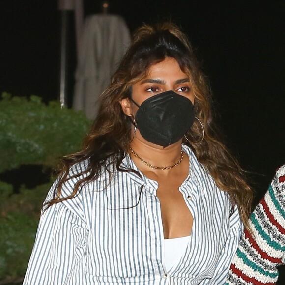 Nick Jonas et sa femme Priyanka Chopra à la sortie du restaurant "Nobu" à Los Angeles, le 20 février 2022.