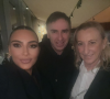 Kim Kardashian et les créateurs de mode Miuccia Prada et Raf Simons à Milan, le 24 février 2022.