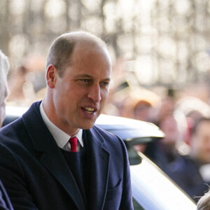 Le prince William, duc de Cambridge, et Catherine (Kate) Middleton, duchesse de Cambridge, accompagnés du prince George de Cambridge, viennent assister au match de rugby Angleterre-Pays de Galles (23-19) le 26 février 2022. 