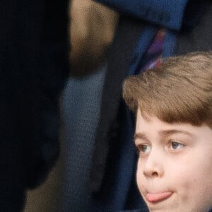 Le prince William, duc de Cambridge, et Catherine (Kate) Middleton, duchesse de Cambridge, accompagnés du prince George de Cambridge, viennent assister au match de rugby Angleterre-Pays de Galles (23-19) le 26 février 2022. @ Mark Pain/PA Images Contributor/ABACAPRESS.COM