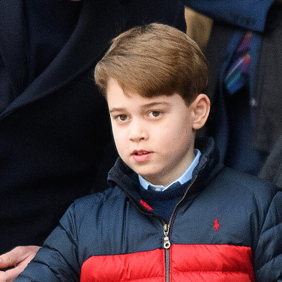 Le prince William, duc de Cambridge, et Catherine (Kate) Middleton, duchesse de Cambridge, accompagnés du prince George de Cambridge, viennent assister au match de rugby Angleterre-Pays de Galles (23-19) le 26 février 2022. @ Mark Pain/PA Images Contributor/ABACAPRESS.COM