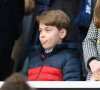 Le prince William, duc de Cambridge, et Catherine (Kate) Middleton, duchesse de Cambridge, accompagnés du prince George de Cambridge, viennent assister au match de rugby Angleterre-Pays de Galles (23-19) le 26 février 2022. @ Mark Pain/PA Images