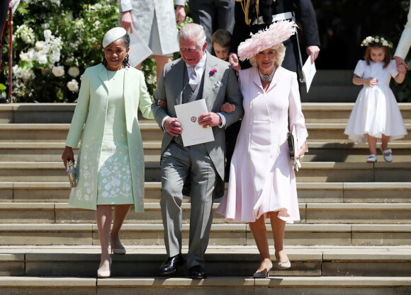 Doria Ragland, Le prince Charles, prince de Galles, et Camilla Parker Bowles, duchesse de Cornouailles - Les invités à la sortie de la chapelle St. George au château de Windsor, Royaume Uni, le 19 mai 2018.