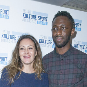 Karole Rocher et son compagnon Thomas Ngijol - Présentation du festival "Kulture Sport" lors d'une conférence de presse au cinéma Panthéon, à Paris le 24 novembre 2014. Le festival "Kulture Sport" se tiendra du 12 au 14 juin 2015 à Bayonne. 