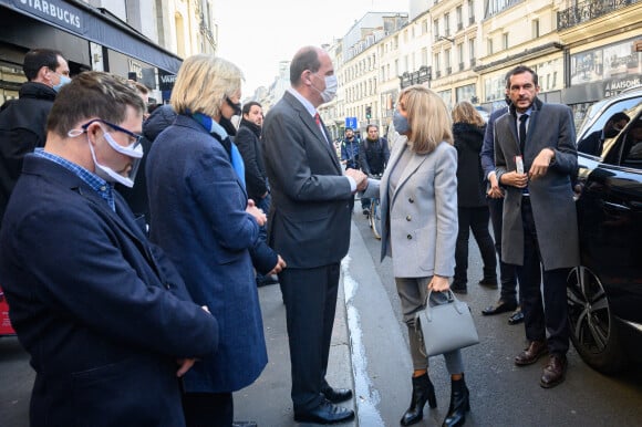 Sophie Cluzel, secrétaire d'Etat en charge des personnes handicapées et Jean Castex, Premier ministre accueillent Brigitte Macron, la Première Dame française avec leurs duos au déjeuner du DuoDay à l'établissement médico-social ESAT Bastille - Les ailes déployées à Paris, France, le 18 janvier 2021