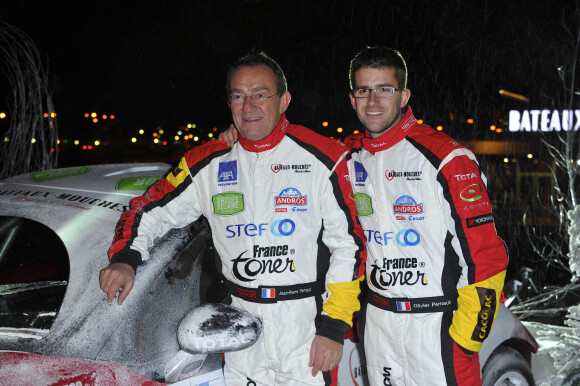 Presentation de la nouvelle voiture de Jean-Pierre et Olivier Pernaut pour le trophee Andros sur le pont de l'Alma a Paris le 4 Decembre 2012. 