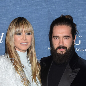 Heidi Klum et son mari Tom Kaulitz au photocall de la soirée "The Hollywood Reporter Nominees Night" à Los Angeles, le 7 mars 2022.