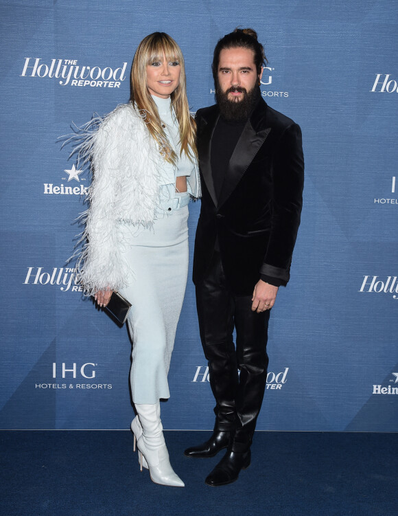 Heidi Klum et son mari Tom Kaulitz au photocall de la soirée "The Hollywood Reporter Nominees Night" à Los Angeles, le 7 mars 2022.
