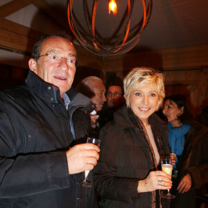 Evelyne Dheliat et Jean-Pierre Pernaut inaugurent le village de noel des Champs Elysees a Paris, le 20 novembre 2013.