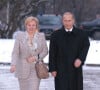 Vladimir Poutine et son épouse de l'époque Lioudmila, allant voter à Moscou