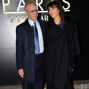 Sophie Marceau et son compagnon Christophe Lambert - Arrivee des people au defile Giorgio Armani Haute Couture Printemps/Ete 2014 au Palais de Tokyo a Paris, le 21 janvier 2014. 