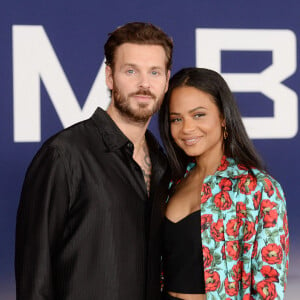 Christina Milian et son mari Matt Pokora au photocall de la première du film "Ambulance" à Los Angeles le 4 avril 2022. 