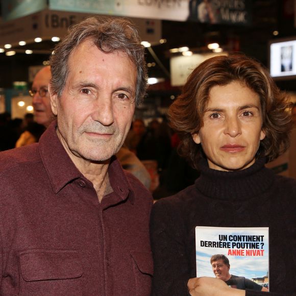 Jean-Jacques Bourdin et sa femme Anne Nivat lors du salon du livre de Paris le 17 Mars 2018 à la Porte de Versailles de Paris. © Denis Guignebourg/Bestimage