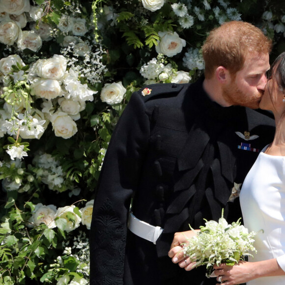 Le prince Harry, duc de Sussex, et Meghan Markle, duchesse de Sussex, à la sortie de chapelle St. George au château de Windsor - Sortie après la cérémonie de mariage du prince Harry et de Meghan Markle en la chapelle Saint-George au château de Windsor, Royaume Uni, le 19 mai 2018.