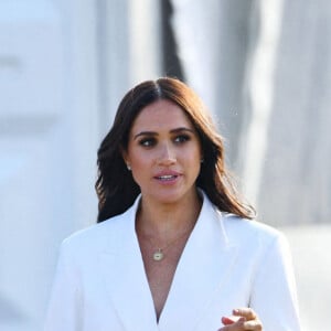 Le prince Harry, duc de Sussex, et Meghan Markle, duchesse de Sussex assistent à un engagement à la veille des Jeux Invictus 2020 aux Pays-Bas, à La Haye, le 15 avril 2022. 