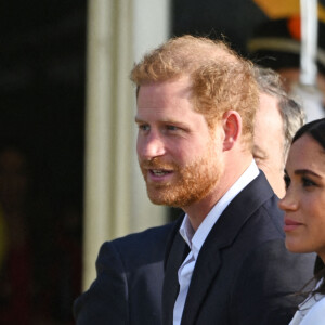 Le prince Harry, duc de Sussex, et Meghan Markle, duchesse de Sussex assistent à un engagement à la veille des Jeux Invictus 2020 aux Pays-Bas, à La Haye, le 15 avril 2022. 