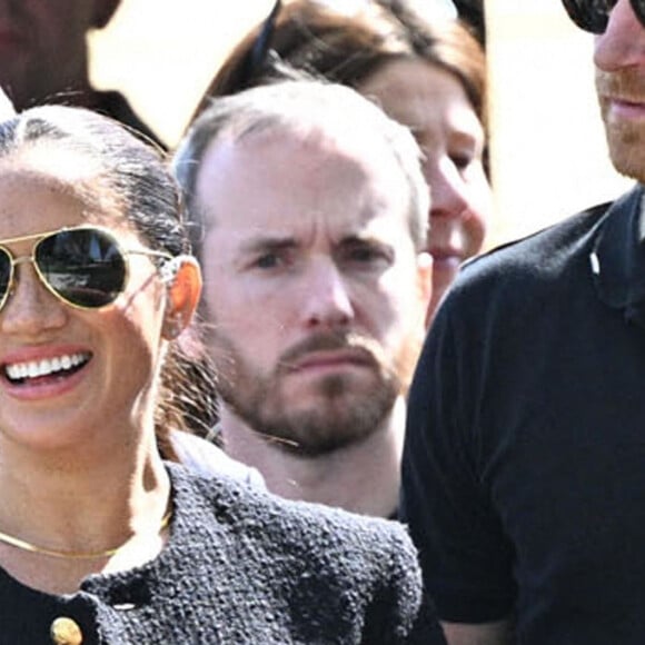 Le prince Harry et Meghan Markle lors du "Land Rover Challenge" au premier jour des Invictus Games 2020 à La Haye, le 16 avril 2022. 