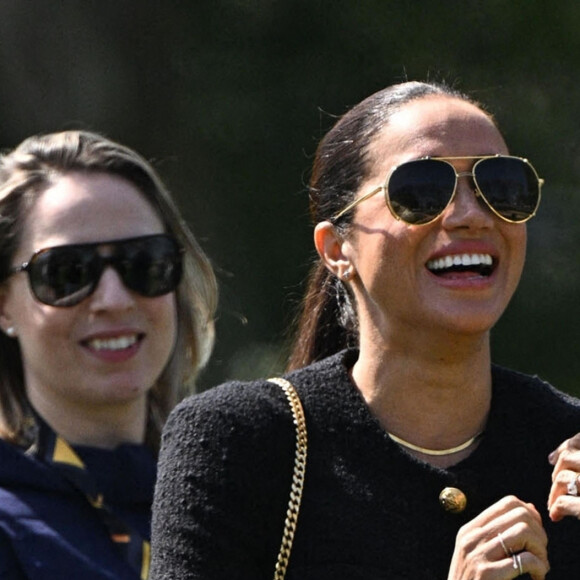 Le prince Harry et Meghan Markle lors du "Land Rover Challenge" au premier jour des Invictus Games 2020 à La Haye, le 16 avril 2022. 