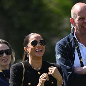 Le prince Harry et Meghan Markle lors du "Land Rover Challenge" au premier jour des Invictus Games 2020 à La Haye, le 16 avril 2022. 