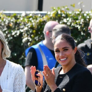 Le prince Harry et Meghan Markle lors du "Land Rover Challenge" au premier jour des Invictus Games 2020 à La Haye, le 16 avril 2022. 