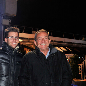Jean-Pierre Pernaut et son fils Olivier posent devant leur Citroen C4 lors de la conference de presse de la 25eme edition du Trophee Andros a Paris le 27 novembre 2013.