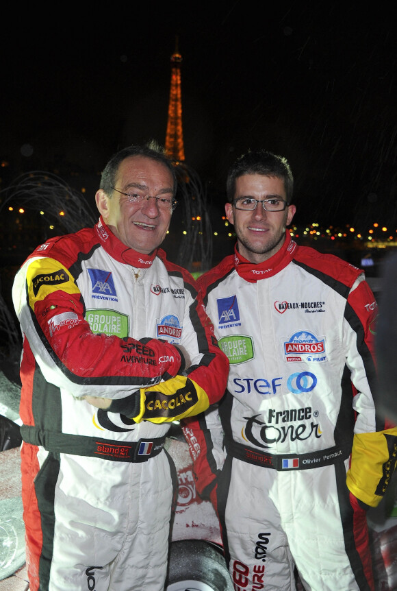 Presentation de la nouvelle voiture de Jean-Pierre et Olivier Pernaut pour le trophee Andros sur le pont de l'Alma a Paris le 4 Decembre 2012.