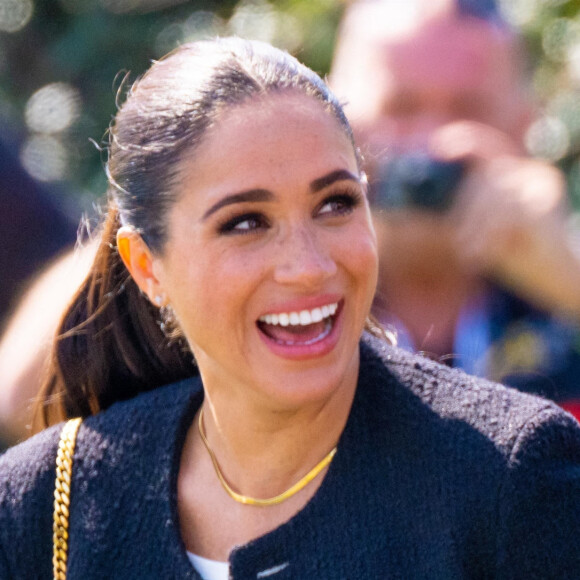 Le prince Harry et Meghan Markle lors du "Land Rover Challenge" au premier jour des Invictus Games 2020 à La Haye, le 16 avril 2022. 