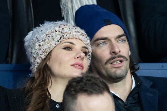 Camille Lacourt et sa compagne Alice Detollenaere (Miss Bourgogne 2010) dans les tribunes lors du match de championnat de Ligue 1 Conforama opposant le Paris Saint-Germain (PSG) aux Girondins de Bordeaux au Parc des Princes à Paris, France, le 23 février 2020. © Cyril Moreau/Bestimage 