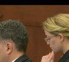 Alejandro Romero, le coneeirge d'un immeuble dans lequel vivaient Johnny Depp et Amber Heard, témoigne qu'il n'a jamais vu Amber Heard avec des traces de coups, des bleus ou une quelconque marque de maltraitance, lors du procès "Johnny Depp vs Amber Heard" au tribunal de Fairfax, le 28 avril 2022. 