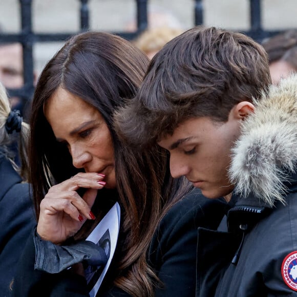 Nathalie Marquay et son fils Tom - La famille de Jean-Pierre Pernaut à la sortie des obsèques en la Basilique Sainte-Clotilde à Paris. © Cyril Moreau/Bestimage