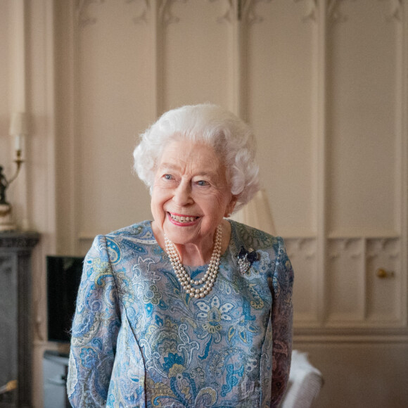 La reine Elisabeth II d'Angleterre reçoit Ignazio Cassis (président de la Confédération suisse) et sa femme Paola, au Palais de Buckingham. Londres. 