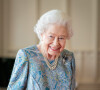 La reine Elisabeth II d'Angleterre reçoit Ignazio Cassis (président de la Confédération suisse) et sa femme Paola, au Palais de Buckingham. Londres, le 28 avril 2022. 