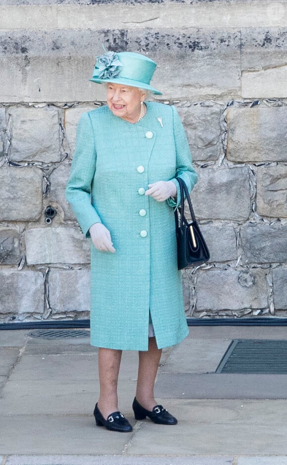La reine Elisabeth II d'Angleterre lors d'une cérémonie militaire, Trooping The Color, célébrant son anniversaire au château de Windsor. Pour la première fois depuis 1955, la cérémonie ne déroule pas dans sa forme traditionnelle, dûe à l'épidémie de Coronavirus (COVID-19) et au confinement lié à cette situation. Londres, le 13 juin 2020 