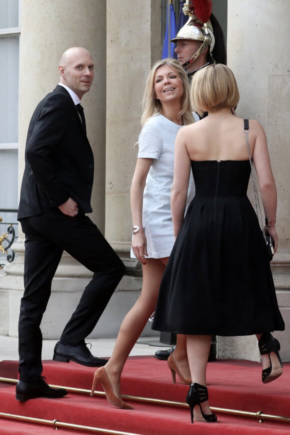 La fille de Brigitte Macron, Laurence Auzière-Jourdan, avec sa fille Emma et un ami - Cérémonie d'investiture du Président de la République à Paris le 7 mai 2022