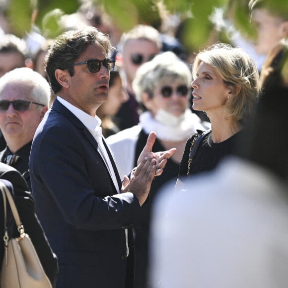 Sylvie Tellier et son mari Camille - Sortie des obsèques d'Antoine Alléno (fils du chef cuisinier français, trois étoiles au Guide Michelin Yannick Alléno) en la collégiale Notre-Dame de Poissy, France, le 13 mai 2022. © Jean-Baptiste Autissier/Panoramic/Bestimage 